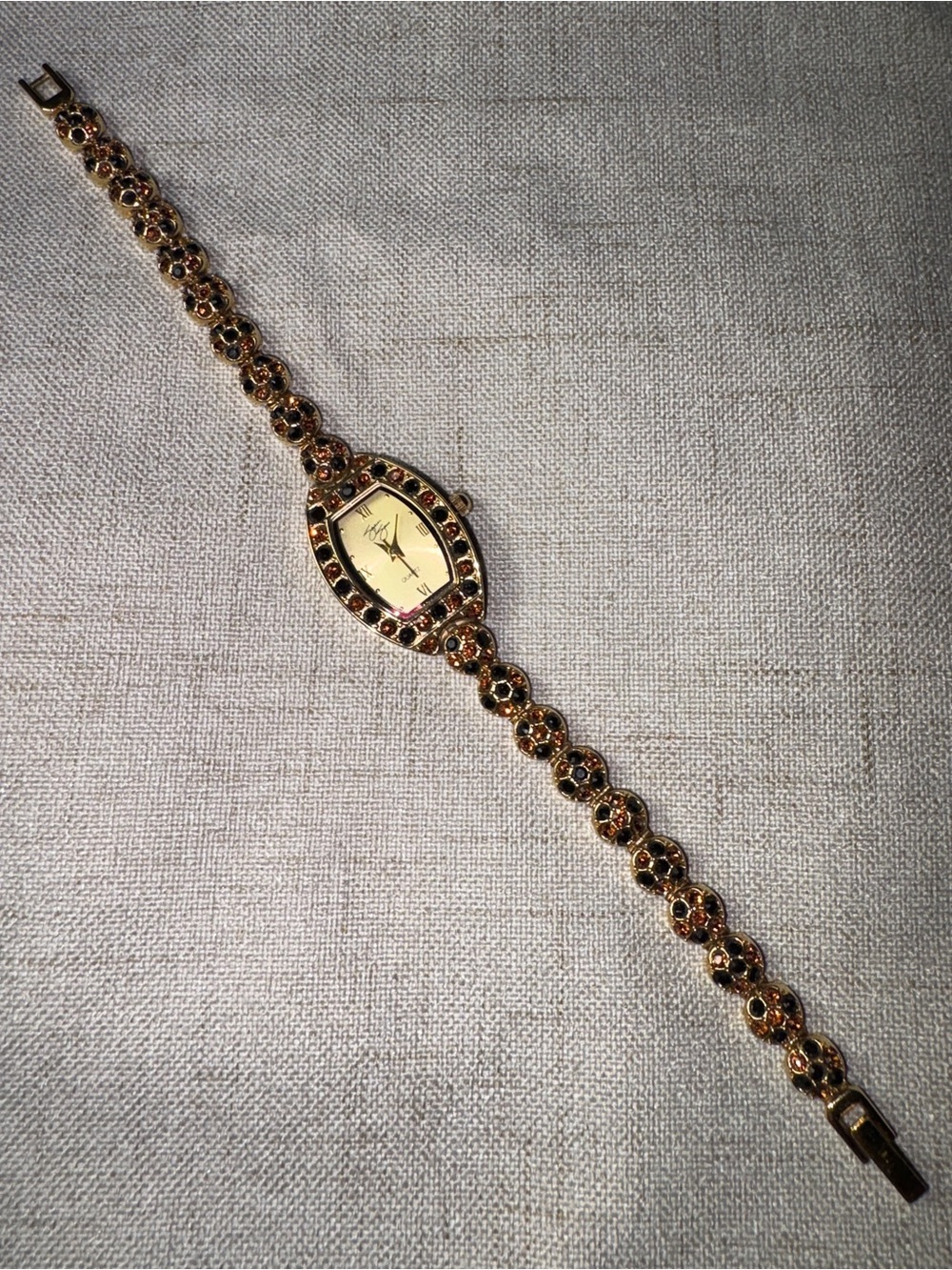 Gold-Tone Garnet Accent Womens Bracelet Watch